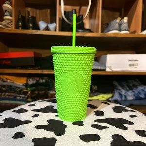 Like green studded Starbucks Tumbler
